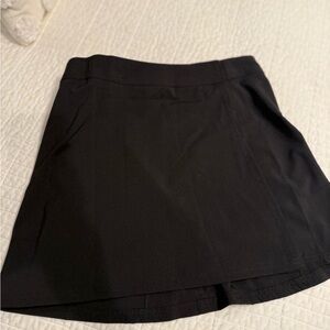 Black Rip Skirt ; worn only once; excellent for travel